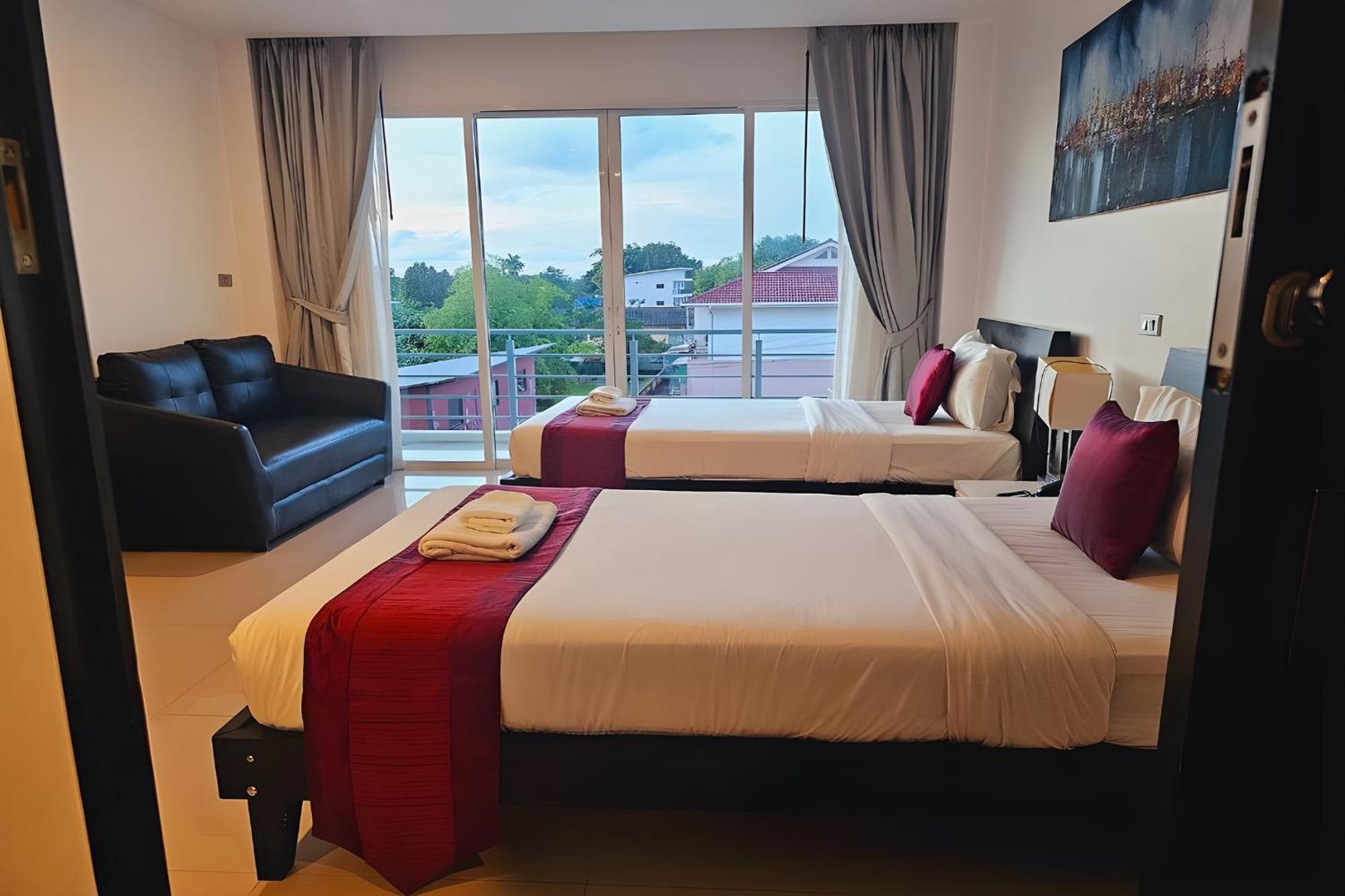 One World One Home Naiharn Hotel Rawai Exterior photo
