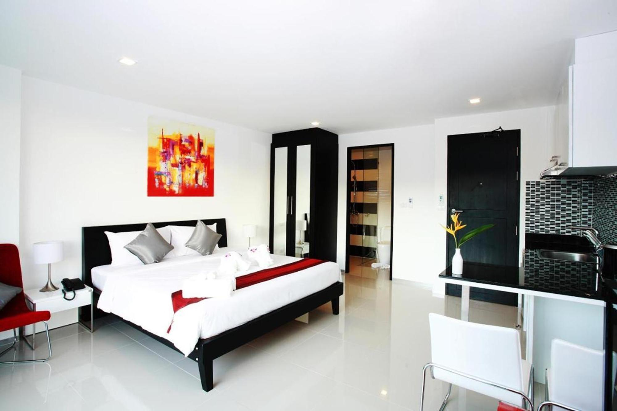 One World One Home Naiharn Hotel Rawai Exterior photo